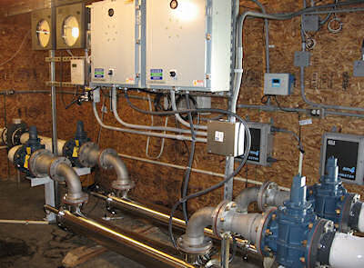 UV Tanks with piping and control panels.